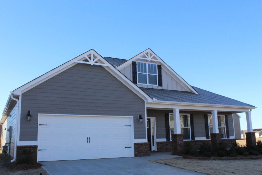 Single family home with new gray siding