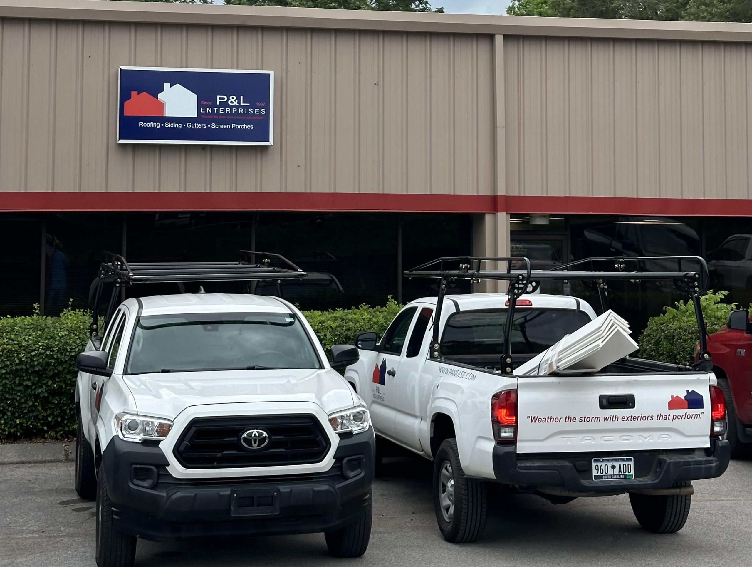 2 P&L branded trucks parked in front of P&L Enterprises location