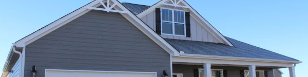 Single family home with new gray siding